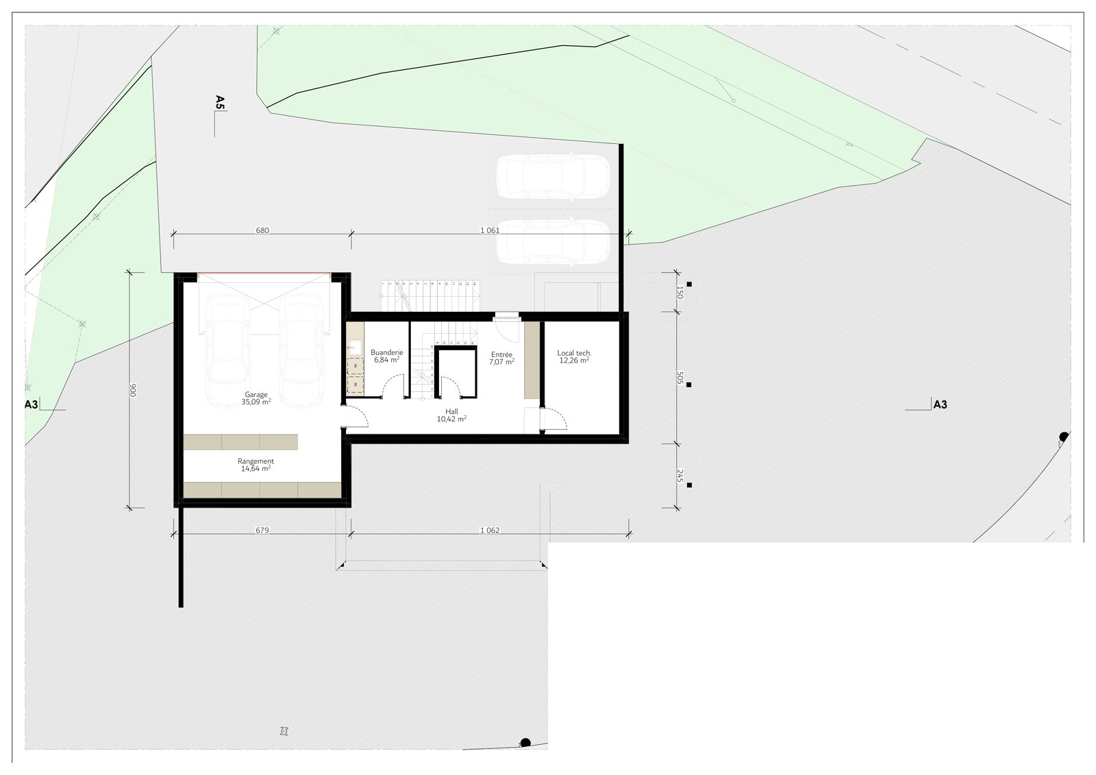 Plan du rez inférieur : garage, rangement, buanderie et local technique.